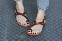 sandalsandspankings:  Unique leather toe ring sandals.