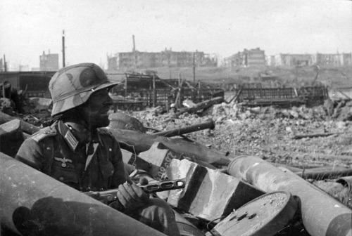 German soldier with captured Soviet PPSH-41 submachine gun, Battle of Stalingrad, World War II.