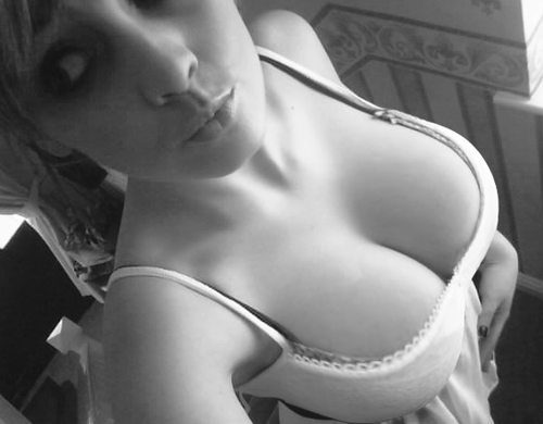 boobsandcleavage:Follow me: Boobs & Cleavage(via Busty Black And White….someone has to know who 