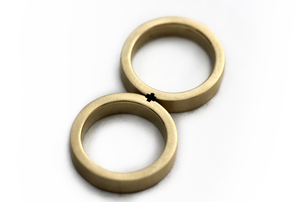 culturenlifestyle:  Puzzle Piece Wedding Bands Couple turned business partners  Eliad