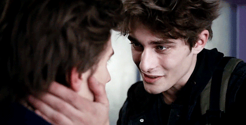 Eliott + Holding Lucas Face While Kissing Him