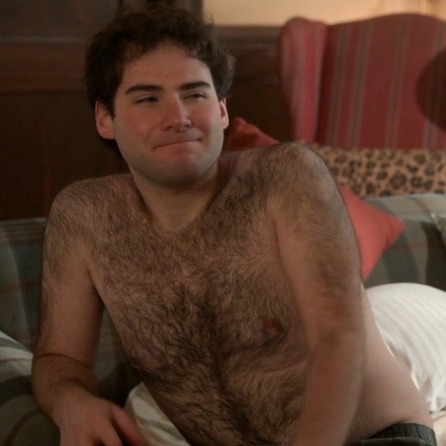 iconfessilovebackhair:The adorable Matthew Gold proudly showing off some seriously sexy twenty-something shoulder and back hair.  (From: The Sex Lives of College Girls.) The stupid girl kicks him out of her bed; I would never let him leave mine. I&rsquo;d