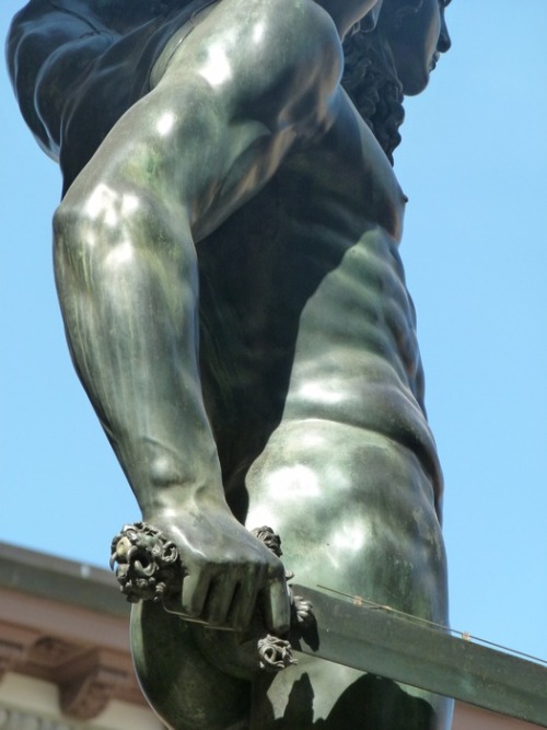 f-l-e-u-r-d-e-l-y-s:  Perseus with the Head of Medusa: Benvenuto Cellini -1554  Sculpture 3.20 m  on a square base with bronze relief panels is located in the Loggia dei Lanzi of the Piazza della Signoria in Florence, Italy. The subject matter of the