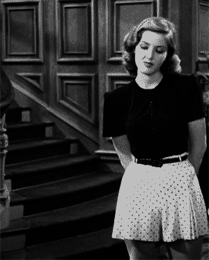 julietcappulets:favorite outfits from black and white movies: martha vickers’ sweater and belted pol