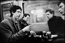 thisaintnomuddclub: The Clash in conversation with NME journalist Tony Parsons, on the London Underground Circle Line in April 1977. Photo by Chalkie Davies