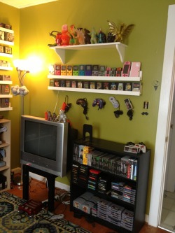 nerdwegian:  gamerpassion:  redfromvoid:  My room for old ass games. I built the arcade cabinet and the white shelves. I completed the shelves last night took a step back, admired my work… Then said in my head “you’re a 26 year old lady.” But