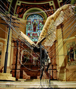 ex0skeletal:  Lucifer (Morning Star) by Paul Fryer(Installation in the Holy Church in Marylebone, 2008. Anodised aluminium, silicon rubber cord, wax work figure, feathers/aluminium, concrete.) 