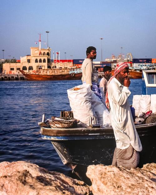 Fishermen sells their catch from a boat along the Dubai creek, 2004.#dubai #corniche #uae #uniteda