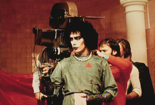 Tim Curry behind the scenes with the crew of The Rocky Horror Picture Show. 