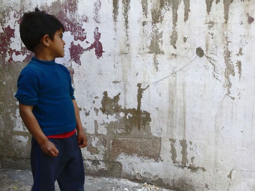 art-tension:Peeling Off Old Paint To Tell Stories Of Palestinian Refugees by street artist Pejac Wit