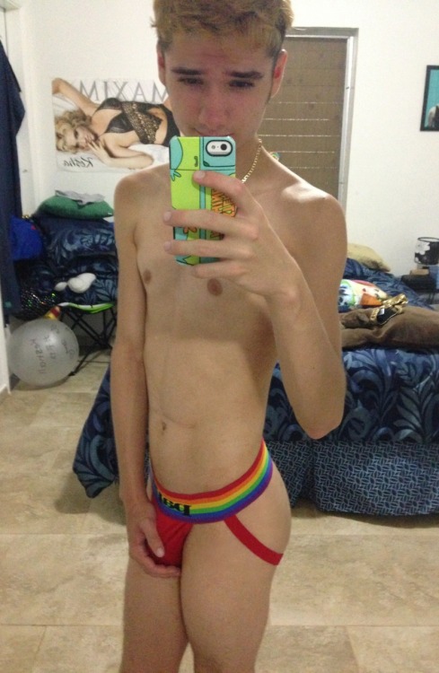 dubie-boy:  superhotboys15:  jaygordon1981:  Adorabe twink in red jock with rainbow strap  For More 