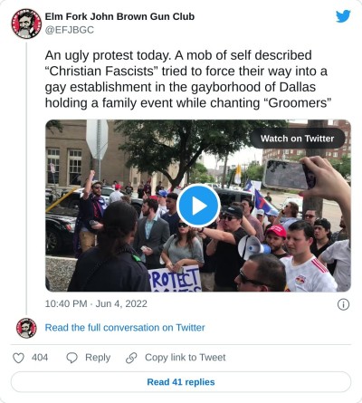An ugly protest today. A mob of self described “Christian Fascists” tried to force their way into a gay establishment in the gayborhood of Dallas holding a family event while chanting “Groomers” pic.twitter.com/2F9NE4rs0P

— Elm Fork John Brown Gun Club (@EFJBGC) June 4, 2022