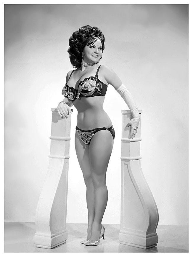 Baby Jane        aka. “The Original Doll”.. 60’s-era stripper managed