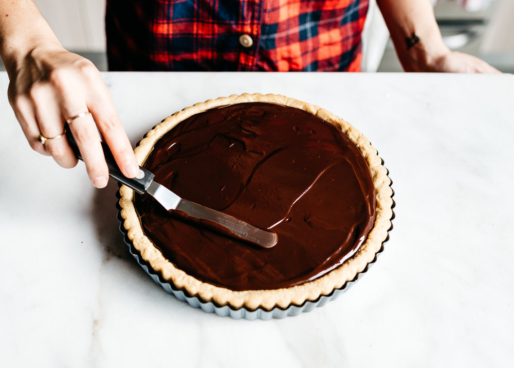 sweetoothgirl:    CHOCOLATE-CARAMEL MACADAMIA NUT TART    Uh&hellip;YES PLEASE!