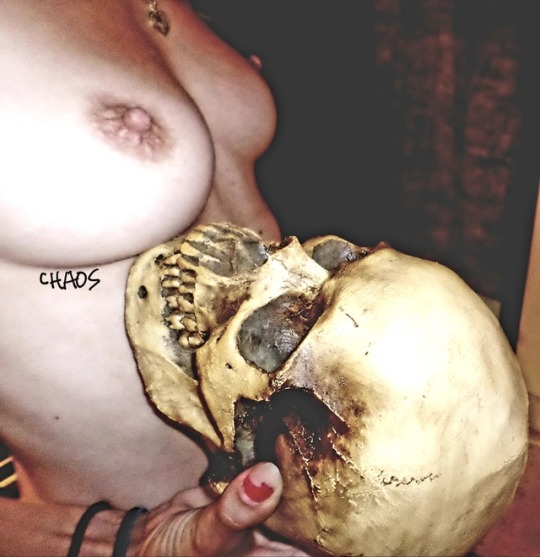georgechaos:  Tittie Tuesday with my skull,  sexy skinny nude girl Halloween pix at Chaos dungeon. Follow me for all original pix of all real amateurs and please reblog me 
