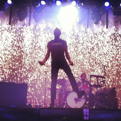 ineedirectiontoperfection:  The Vince t-shirt on stage tonight @ FIB A few Victims were in barrier wearing the Vince t-shirt tonight and this looks like Brandon’s response! :) (x) 