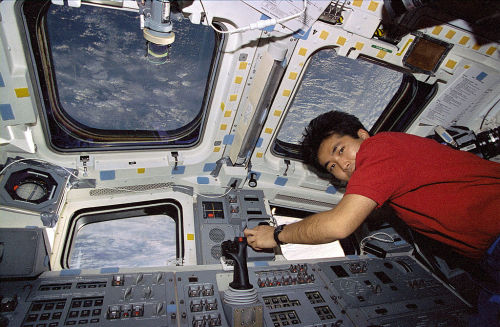 Koichi Wakata, the first Japanese astronaut in space, on the flight deck of Space Shuttle Endeavour,