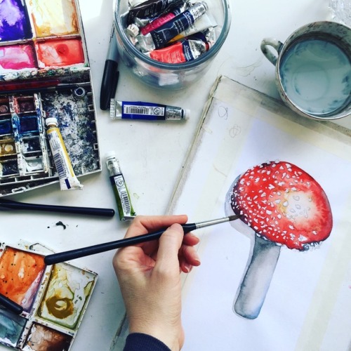 Painting a sweet little mushroom in the sunshine.