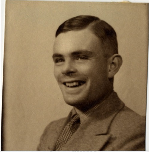 almaviva90:   Alan Turing posing for his passport photograph, c. 1930s - c. 1940s (from the archives of King’s College, Cambridge)  It’s always sad to remember how such a great man’s life was needlessly cut short but at least we can get a small