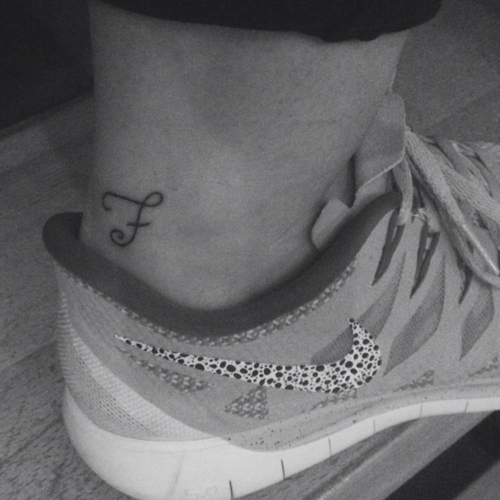 Ankle tattoo saying 