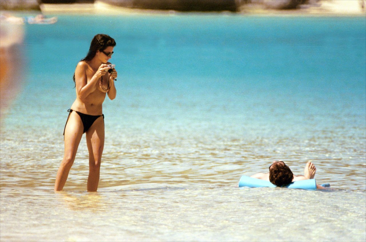 toplessbeachcelebs:  Penelope Cruz (Actress) swimming topless on the beach (February