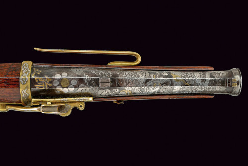 A beautiful gold and silver inlaid matchlock pistol originating from Japan, 19th century.