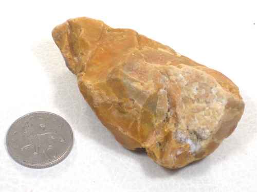 Too many photos of this sort of low grade jasper with pockets of quartz. Now that I see the last pho