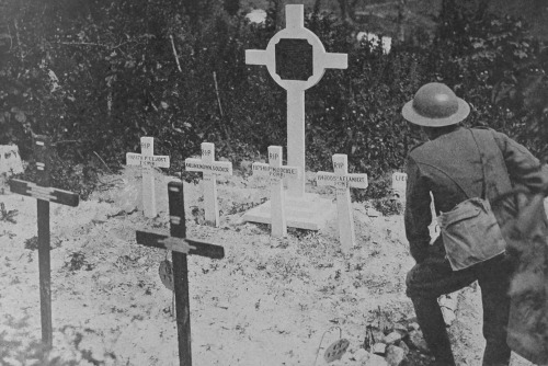 theworldofwars:A Canadian Soldier At The Graves Of His Comrades At Vimy Ridge 1917. 