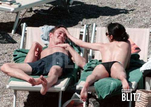 toplessbeachcelebs:  Andrea Corr (Singer) sunbathing topless in Taormina, Italy (April 2001) 