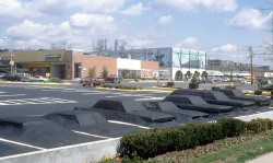 humanscalecities:  Ghost Parking Lot - National Shopping Centers parking lot - Hamden, CT - USA - 1977 - Main section of asphalt covered automobilesTwenty automobiles are buried under asphalt at various graduated levels, from full exposure of the body