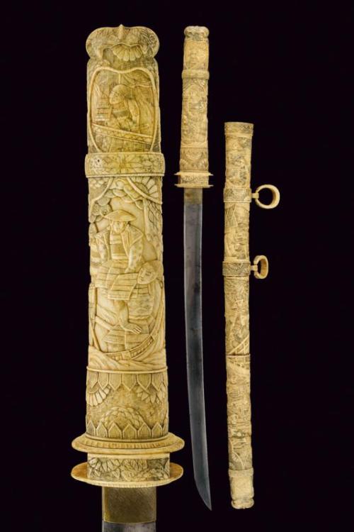 Japanese wakizashi with carved ivory mounts, 19th century.from Czerny’s International Auction House