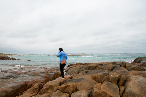 Playing on the rocks close to the angry waves(Peaceful Bay, Western Australia)