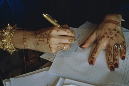 aswiya:  A doctoral candidate in anthropology works on her dissertation.    JODI COBB  