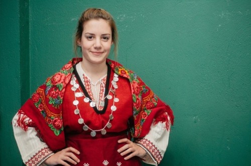 Greek girls from Peloponnesean dance ensemble in traditional greek thracian costumes 