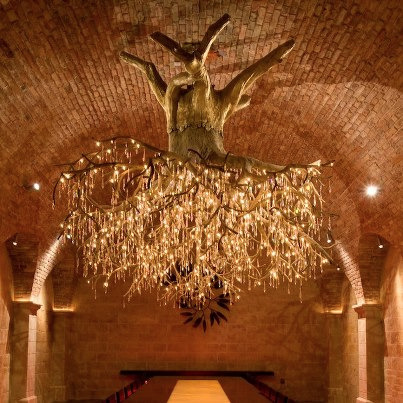 sixpenceee:  The above tree chandeliers were made by artist Donald Lipski. 