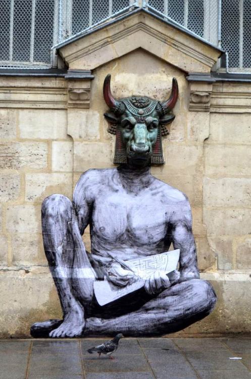 asylum-art-2:The infernal machine – The latest street art creations of french artist Levalet Here a