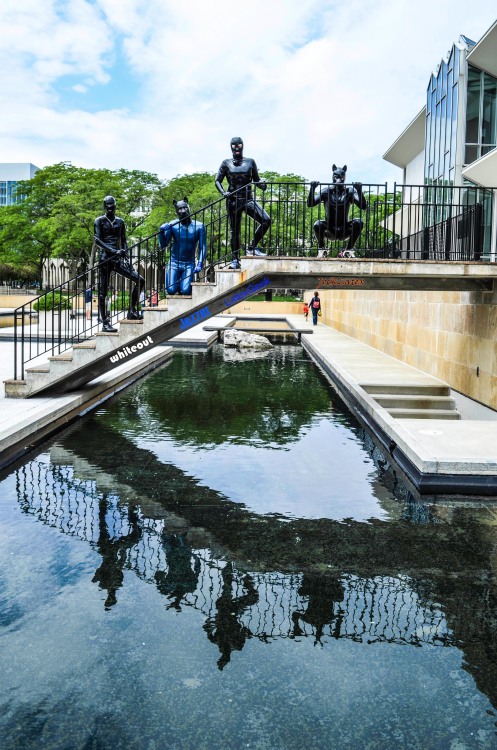 rubbertheworld: Shiny rubber shoot in the Yamasaki Reflecting Pool at Wayne State University with Je