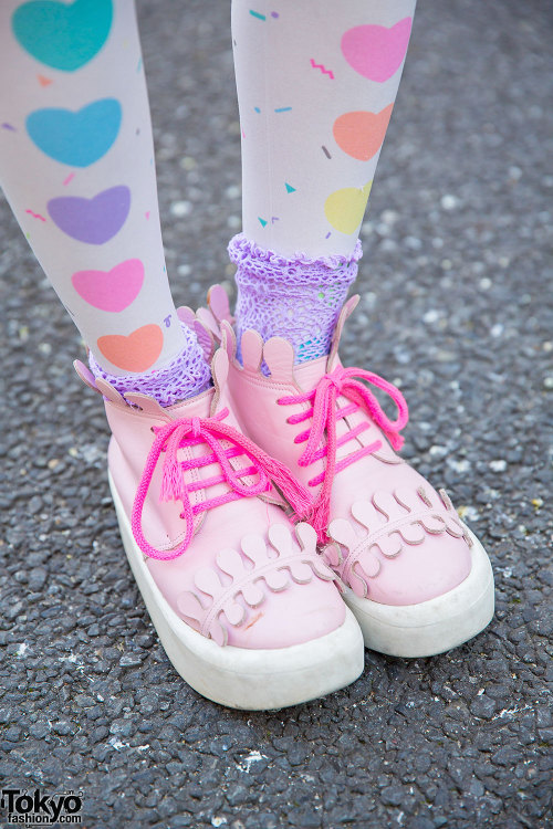 19-year-old Pachiko on the street in Harajuku wearing a Nadia cat tee, heart tights from Kinji, a Bu