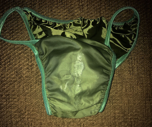 Her favorite shiny green satin panties after another day at work.  I think her tight pants rubbing t
