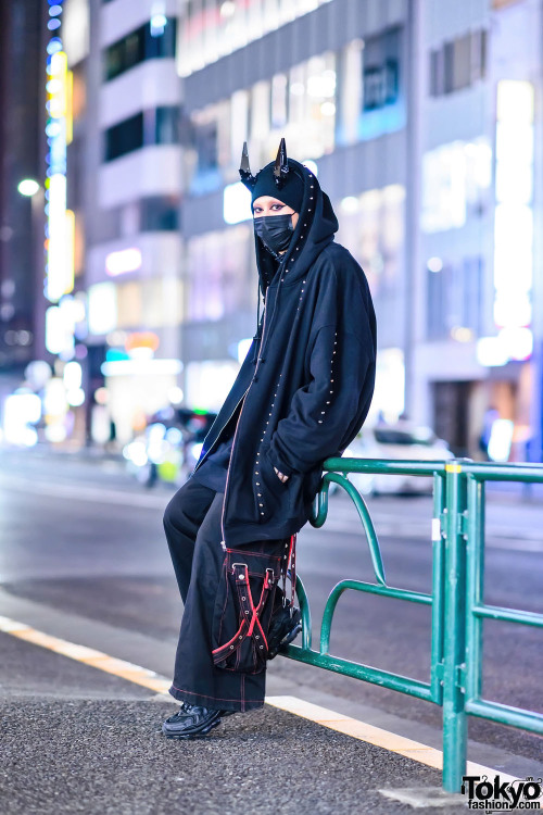 Japanese fashion industry staffer Cham on the street in Harajuku wearing layered tops by Ikumi with 