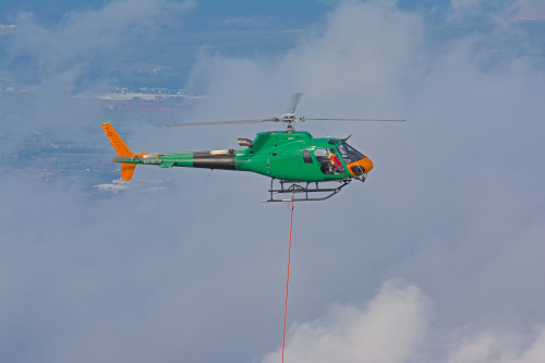 Helicopter over Montserrat mountains