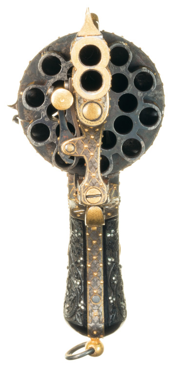 machiavellianfictionist:Luxurious twenty shot double action pinfire revolver with carved ebony grips