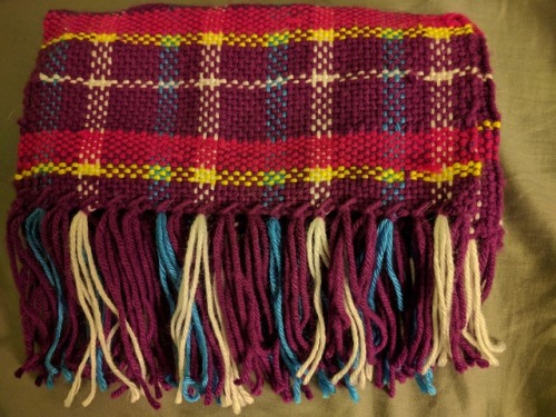 Crystal Prep Academy Plaid ScarfMy first project off my rigid heddle loom.Approx 9″ x 68.5″ long.