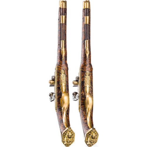 A pair of brass barreled flintlock pistol crafted by Felix Werder of Zurich, Switzerland, circa 1660