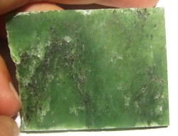 fuckyeahmineralogy:  A chunk of unpolished nephrite jade. Jade is actually one of either two minerals, being nephrite or jadeite. Both minerals are in two totally different groups: amphiboles and pyroxenes, respectively.