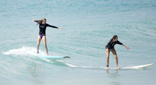 03/01/15 - Cara Delevinge surfing in Barbados with Suki Waterhouse.