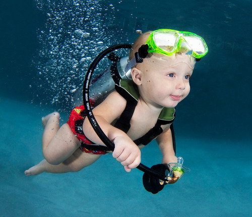 flavorwire:Cute babies learning to swim. You. Are. WELCOME. 