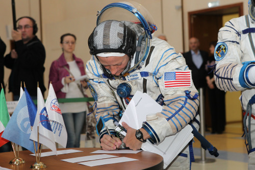 fuckyeahfemaleastronauts:(Star City, 30 April 2013) Karen Nyberg signs in for the start of final qua