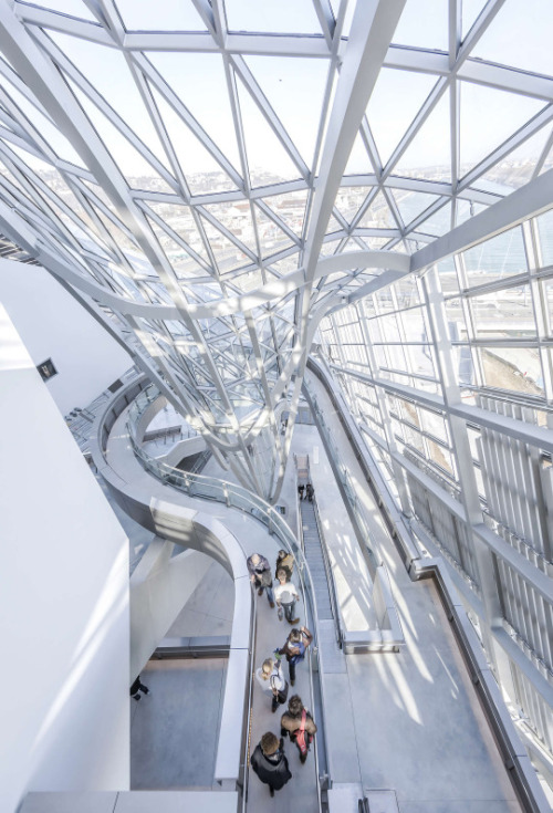 really-shit:  Musée des Confluences designed by  Coop Himmelb(l)auThe Musée des Confluences understands itself not as an exclusive “Temple of the Muses” for the educated elite, but as a public gateway to the knowledge of our time. It stimulates