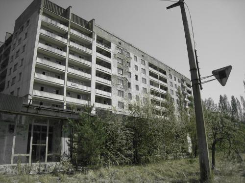 polarthebibear:  A collection of photos from Chernobyl, Pripyat and the surrounding area. Part 2 of 3. The top photo is a picture of the Chernobyl nuclear plant from the top of a Pripyat hotel.  